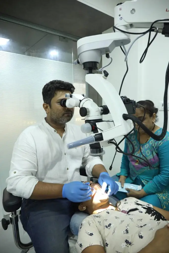 Dr. Gautam Shetty Microscopic Endodontist performing root canal treatment Kalyan