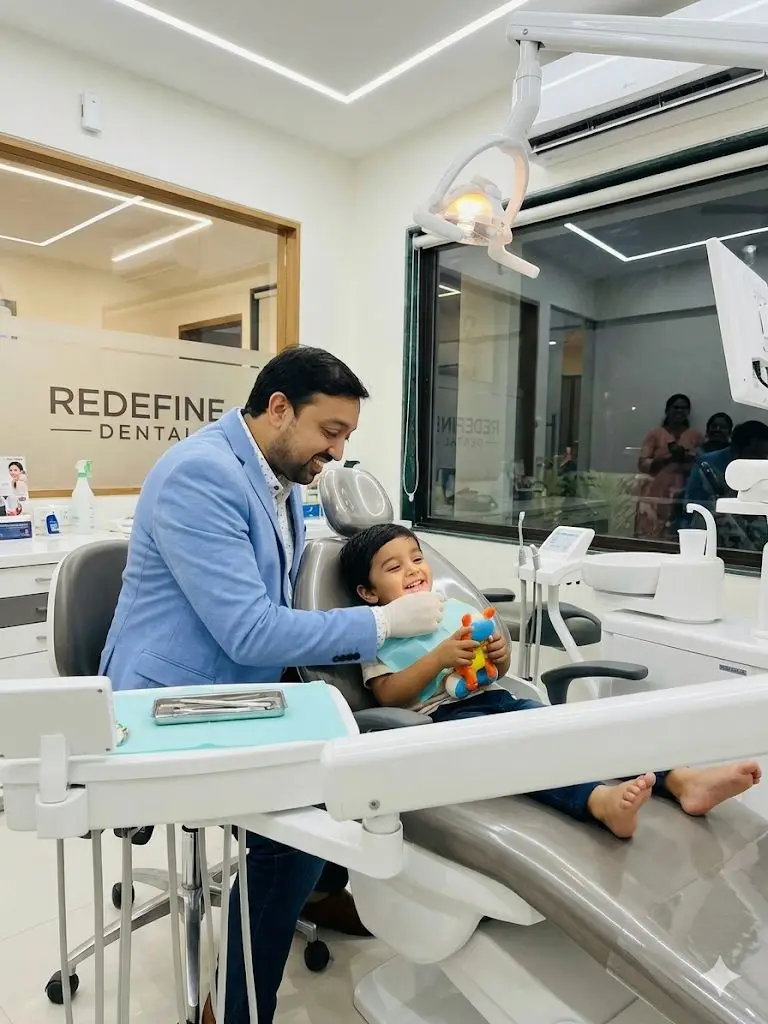 KID BEEN GIVE SPECIAL CARE AND TREATMENT DONE BY PEDODONTIEST AT REDEFINE DENTAL CLINIC 